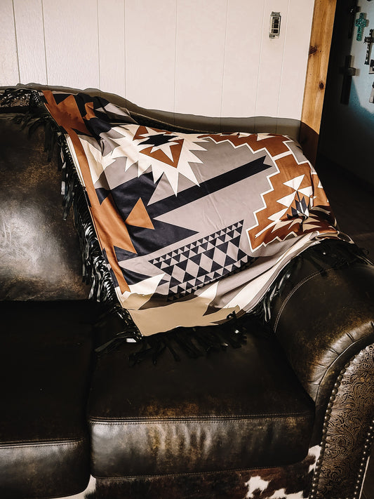 Punchy Cowhide Fringe Blanket